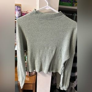Small light green sweater from Kohls. No stains or rips. A bit cropped.